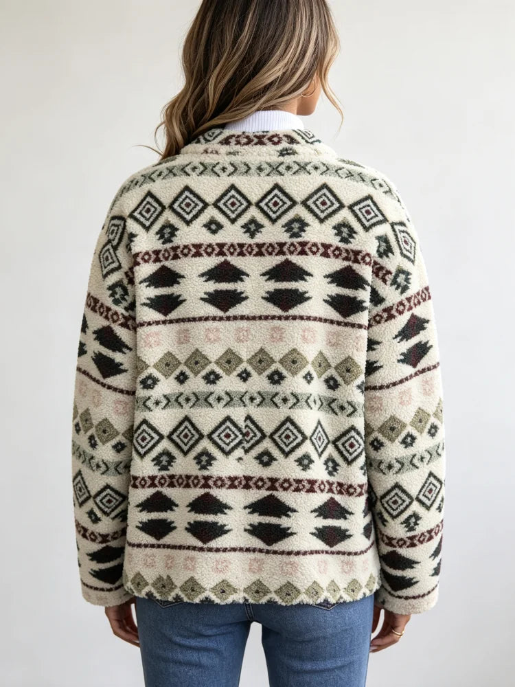 Women's winter fleece jacket with Aztec print, front view.