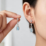 Sterling silver dangle drop earrings with sea blue CZ stones for women by HSF Marketplace