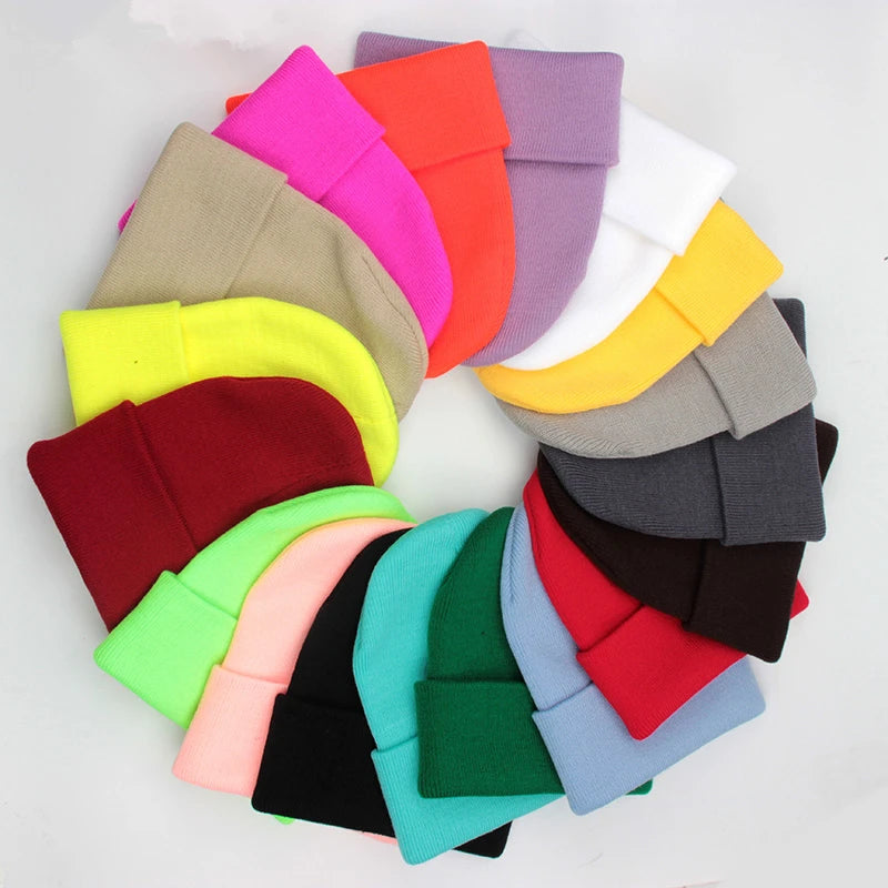 Unisex soft knitted winter beanie in a women's hat style, shown in one of 24 available colors
