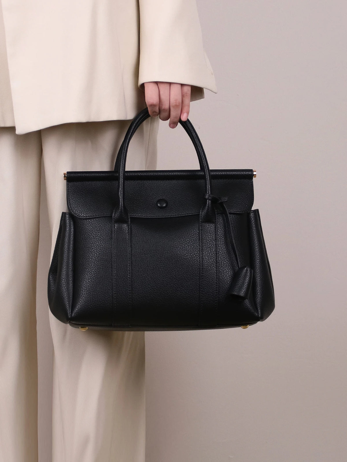 Vintage women's handbag by HSF Marketplace featuring a soft leather flap messenger style for office and commute.
