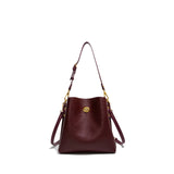 Elegant burgundy PU leather women's handbag featuring a large capacity bucket design and shoulder strap for versatile style