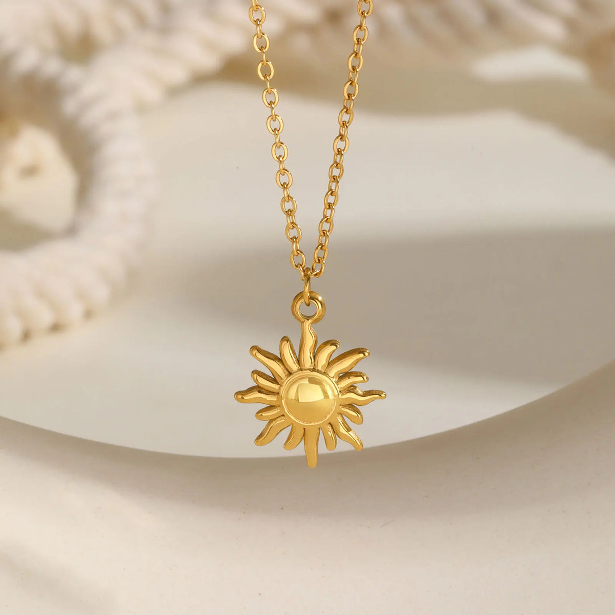 Stainless steel spiral sunflower pendant necklace for women, 18K gold plated, waterproof boho jewelry with stackable design.