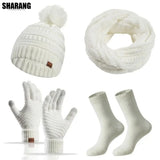 Women’s warm winter hat, scarf, and gloves set in a coordinated design for cold-weather wear