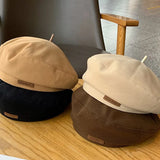 Women's luxurious woolen beret hat by HSF Marketplace for autumn and winter style
