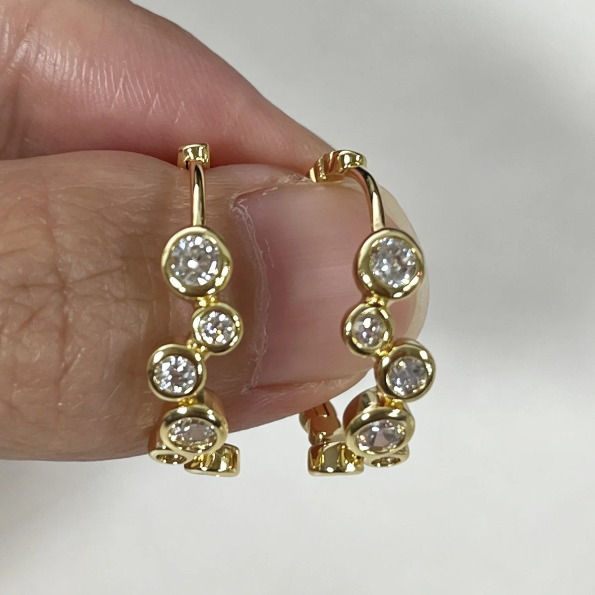 14K gold moissanite bubble hoop earrings by HSF, featuring clustered round stones and a polished finish