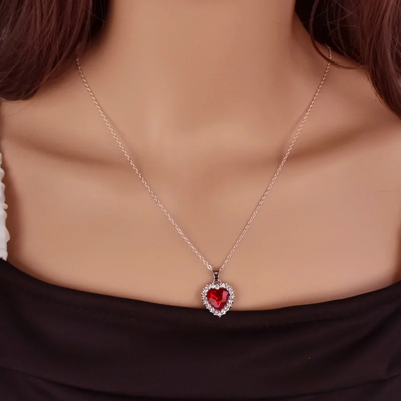 Elegant women's jewelry necklace featuring a crystal heart pendant with rhinestones, perfect for parties and gifts.
