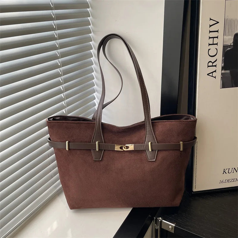 Leopard print shoulder tote bag by HSF Marketplace with brown faux leather trim, gold lock detail, spacious design for women.