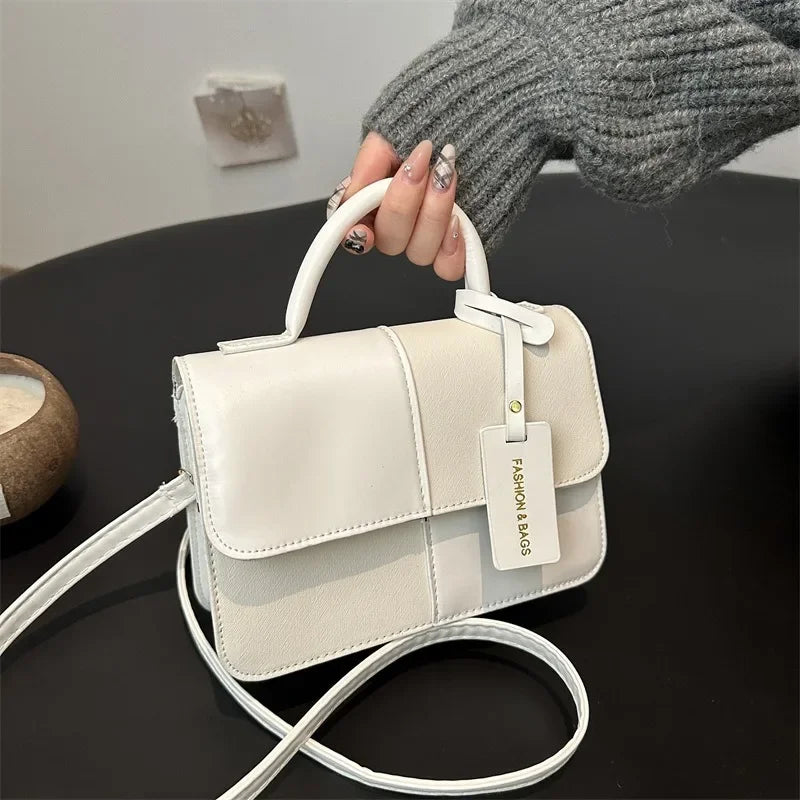 Elegant women's crossbody handbag with geometric pattern, snap closure, stylish tote for everyday use, by HSF Marketplace.