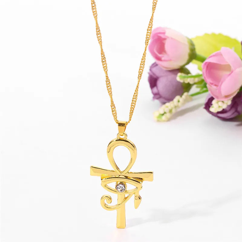 Eye of Horus Egypt charm pendant featuring Ankh cross, religious jewelry for women, worn as a choker necklace.