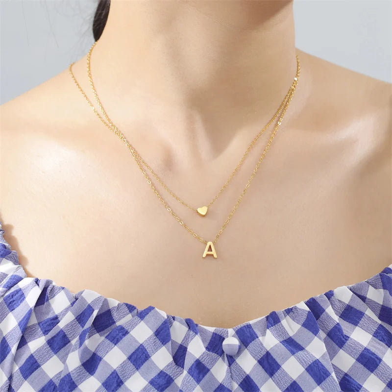 Tiny heart initial necklace for women, gold and silver layered charm jewelry by HSF Marketplace