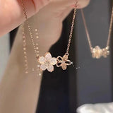 Elegant zircon cherry blossom necklace for women and girls, featuring delicate floral design and a stylish choker style Jewelry.