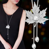 Long geometric crystal pendant necklace for women, featuring pearls and statement jewelry design from HSF Marketplace.