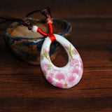 Women's ceramic fashion necklace with pendant, stylish jewelry for women, designed by HSF Marketplace.