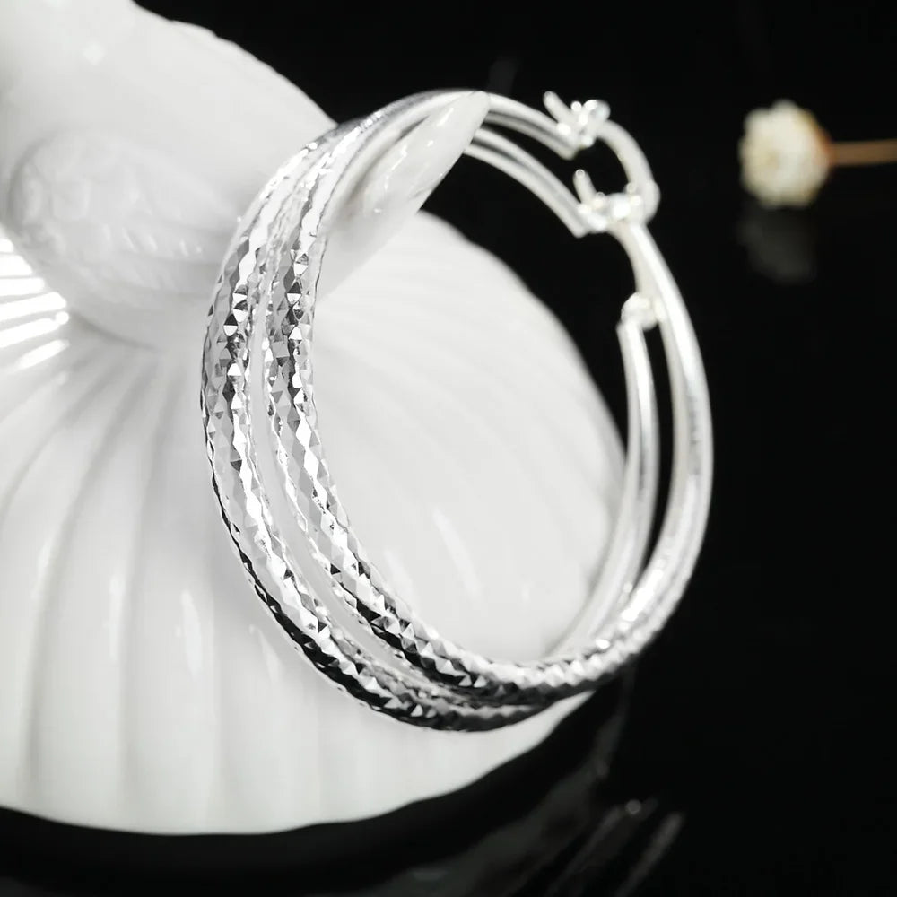 925 sterling silver 5CM circle hoop earrings for women, close-up jewelry design by HSF Marketplace