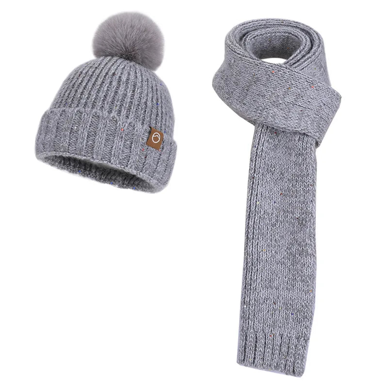 Women's wool knit neck scarf, gloves and cap set in coordinated winter colors