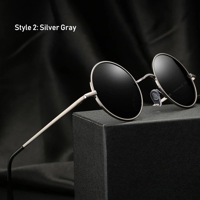 Retro vintage round polarized sunglasses for men and women with black lenses, alloy metal frame, UV400 protection, designer style.