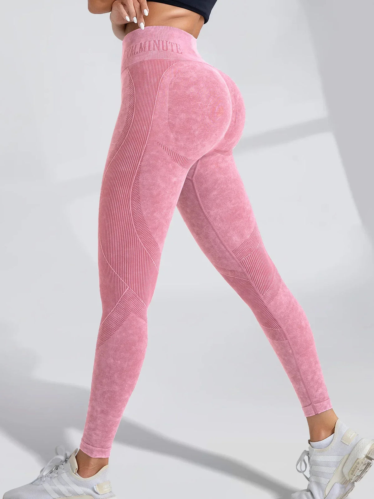 Women's high waist hip lift seamless leggings with elastic knit fabric for gym, yoga, and fitness exercises