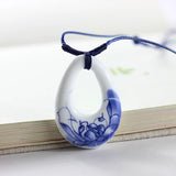 Close-up of women's ceramic fashion necklace with pendant from HSF Marketplace, showcasing intricate design and stylish jewelry for women.