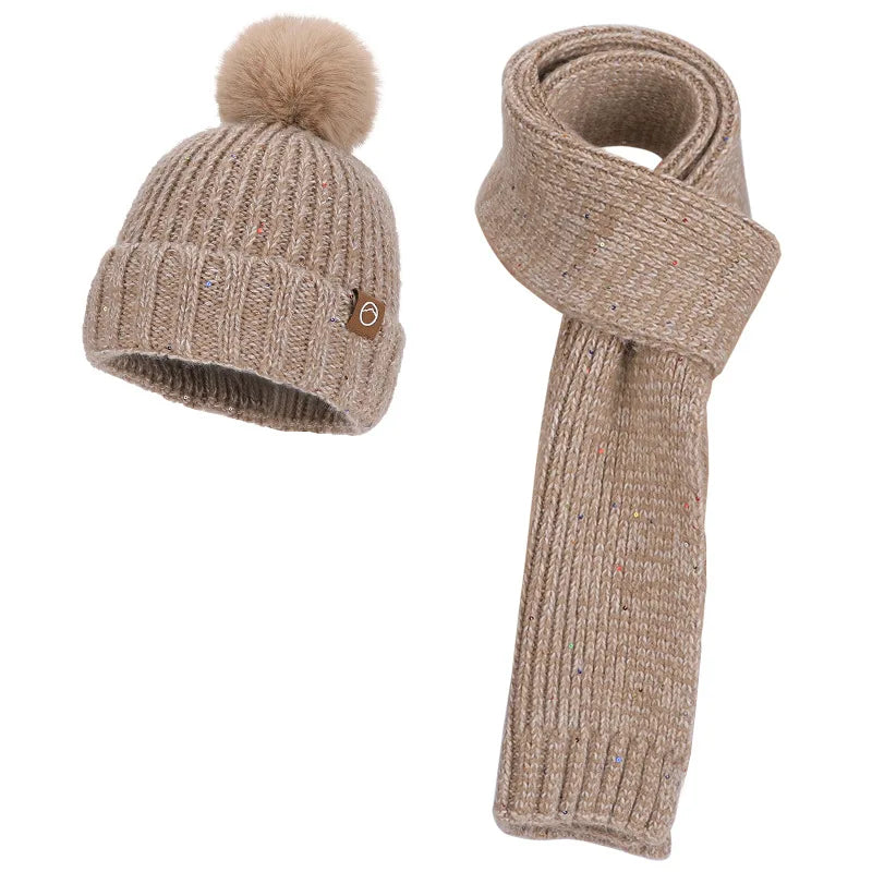 Women’s wool knit winter hat, neck scarf, and gloves set for warmth