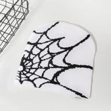 Women's knitting spider web skullies beanie, Y2K goth pullover pile cap in a warm hip-hop street style