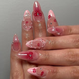 24-piece pink almond false nail tips with bowknots, love hearts and pearl design by HSF Marketplace