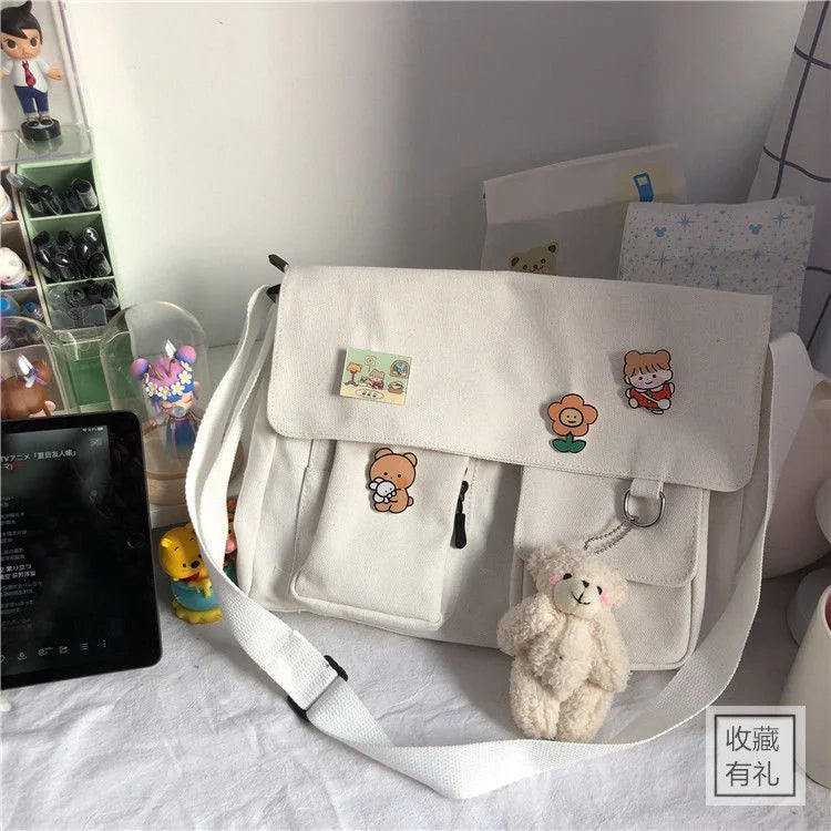 Women’s casual messenger handbag by HSF Marketplace featuring printed canvas, shoulder strap, and interior pouch for everyday use.
