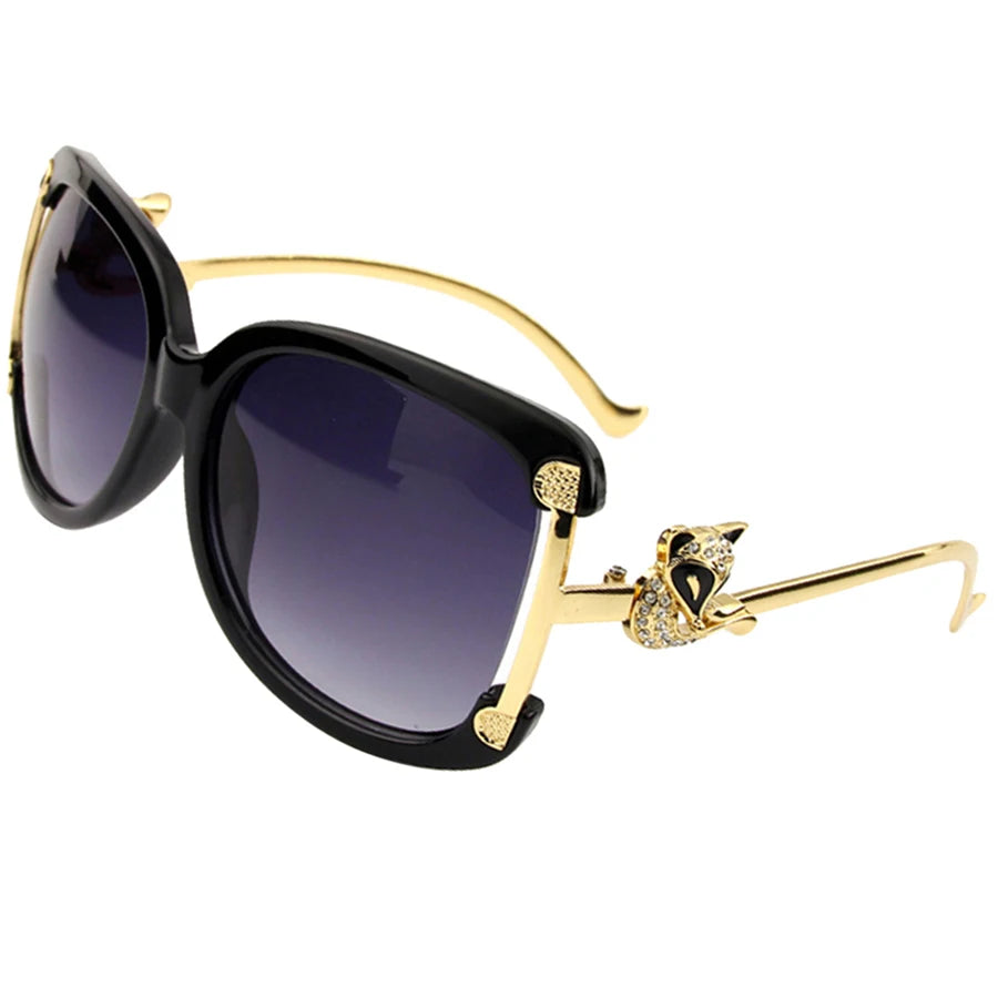 Women's oval retro sunglasses with gold fox design by HSF Marketplace
