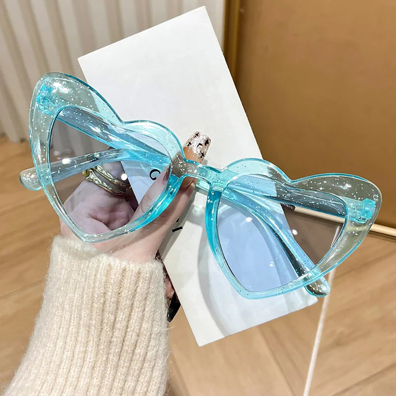 Pink heart-shaped transparent sunglasses for girls by HSF Marketplace, perfect for beach parties and photo fashion accessories.