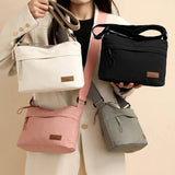 HSF Marketplace women's canvas shoulder crossbody bag with three main pockets, high capacity multi-pocket purse for mothers and shopping.