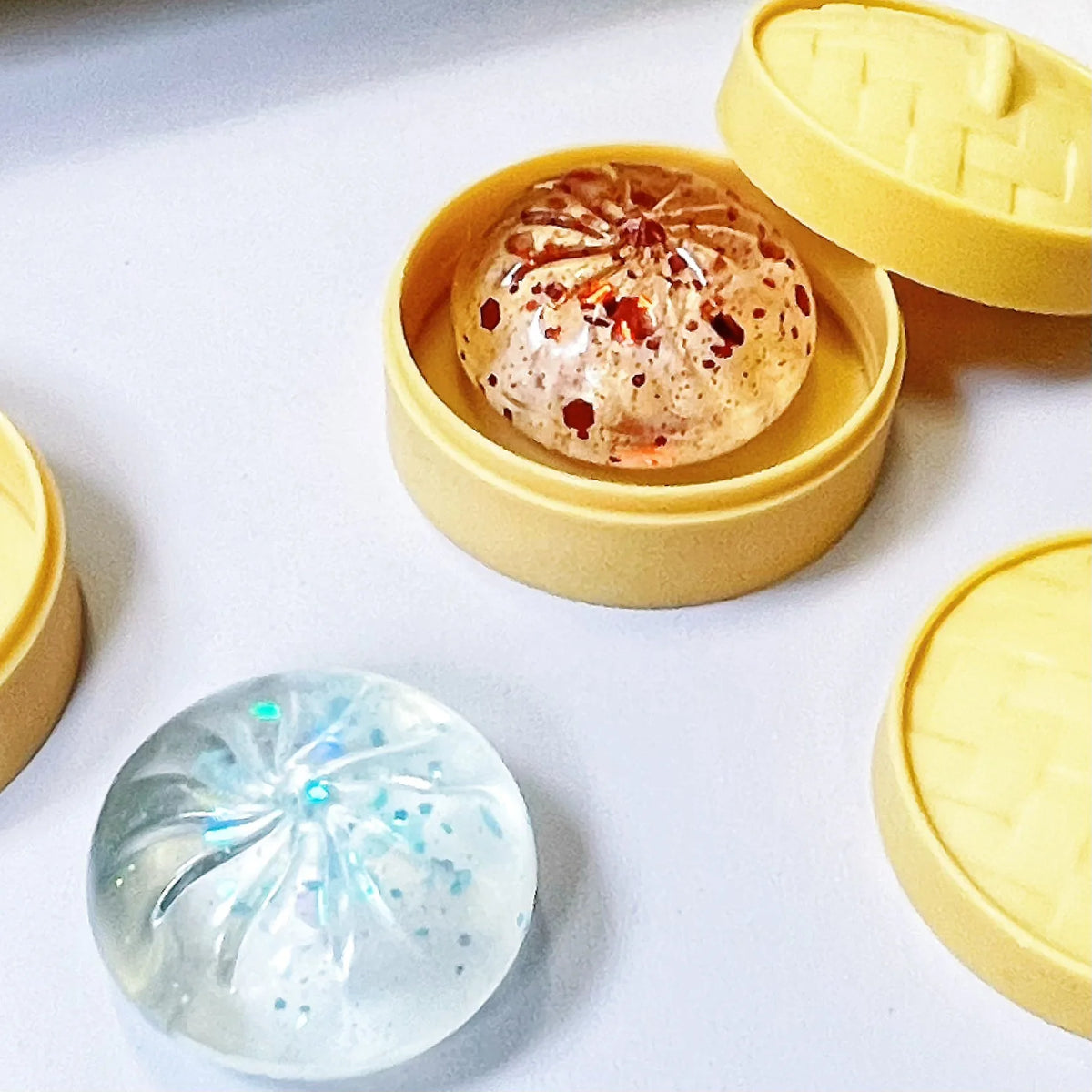 HSF Marketplace crystal mini dumplings and steamed bun squishy set, soft stress relief fidget toys with steamer design for calming sensory play