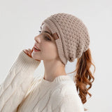Women's fleece-lined slouchy beanie with ponytail hole and ear flaps, warm winter hat in fashion style