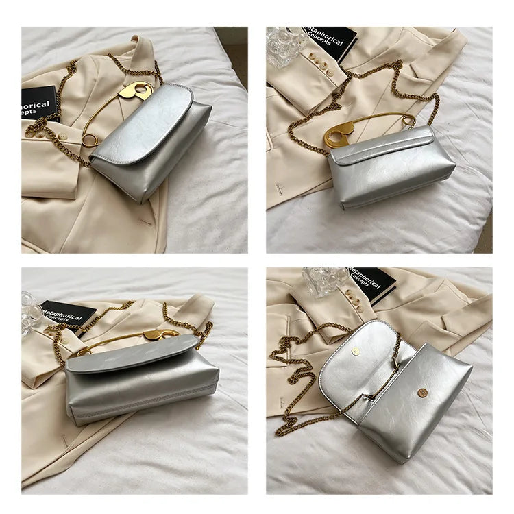Red retro metal pin design women’s PU leather crossbody bag with chain strap, stylish handbag and clutch from HSF Marketplace.