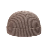 Warm knitted melon hat winter beanie for women and men, soft textured design in a classic rounded shape