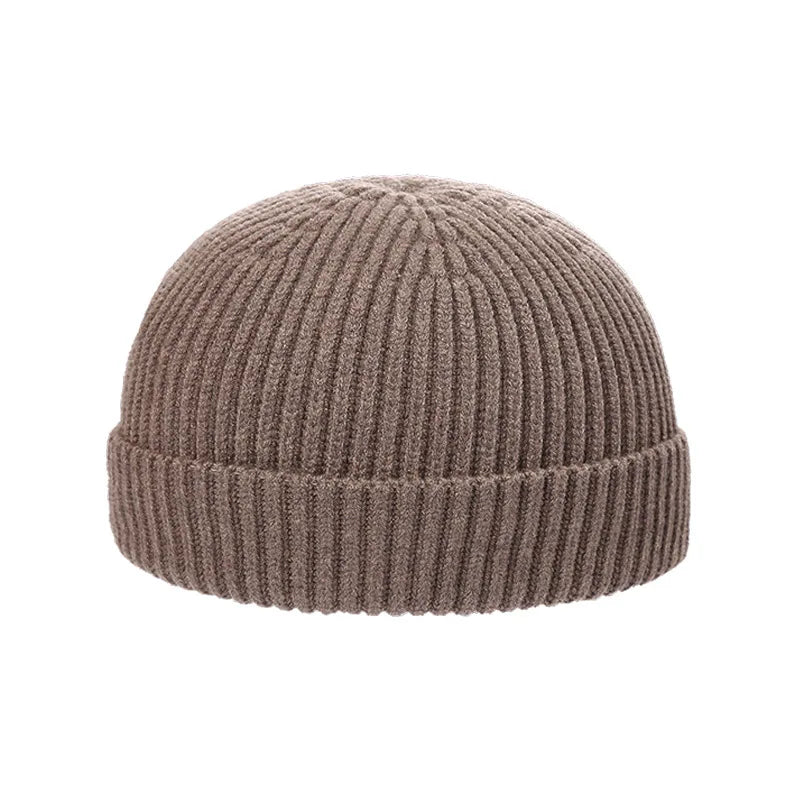 Warm knitted melon hat winter beanie for women and men, soft textured design in a classic rounded shape