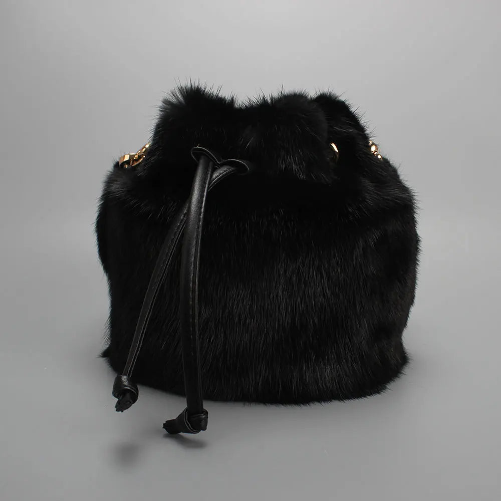 Real mink fur bucket handbag for women, luxury fluffy crossbody bag with evening style, perfect for winter fashion.