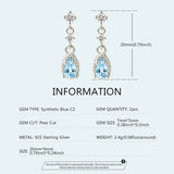 Sterling silver dangle drop earrings with sea blue CZ stones for women by HSF Marketplace