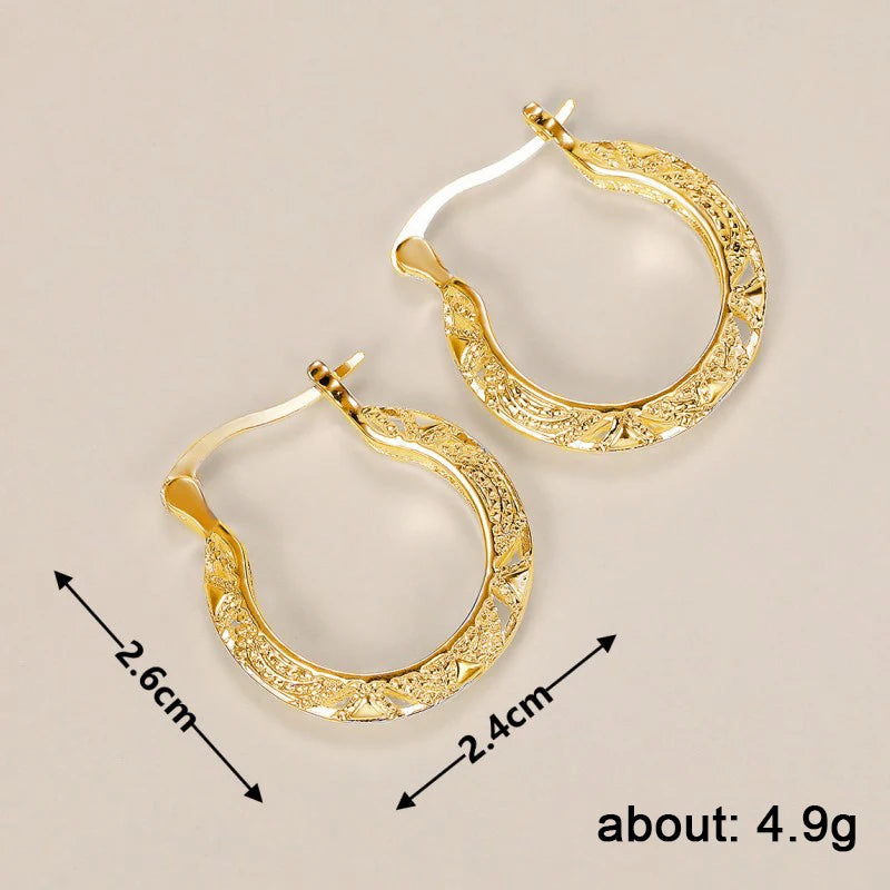 Huitan hollow out hoop earrings for women, modern metal jewelry in a sleek openwork design
