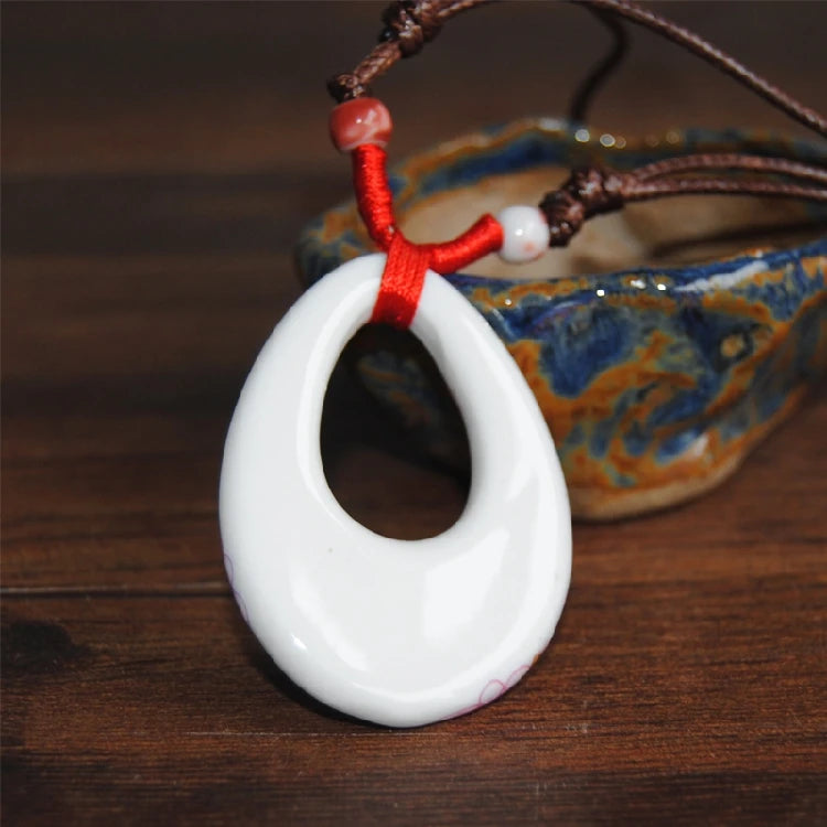 Women's ceramic fashion necklace with pendant, wholesale jewelry by HSF Marketplace, stylish jewelry for women and ladies.