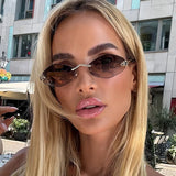 Frameless rhombus-shaped personalized women's sunglasses by HSF Marketplace with UV400 protection and elegant, versatile design.