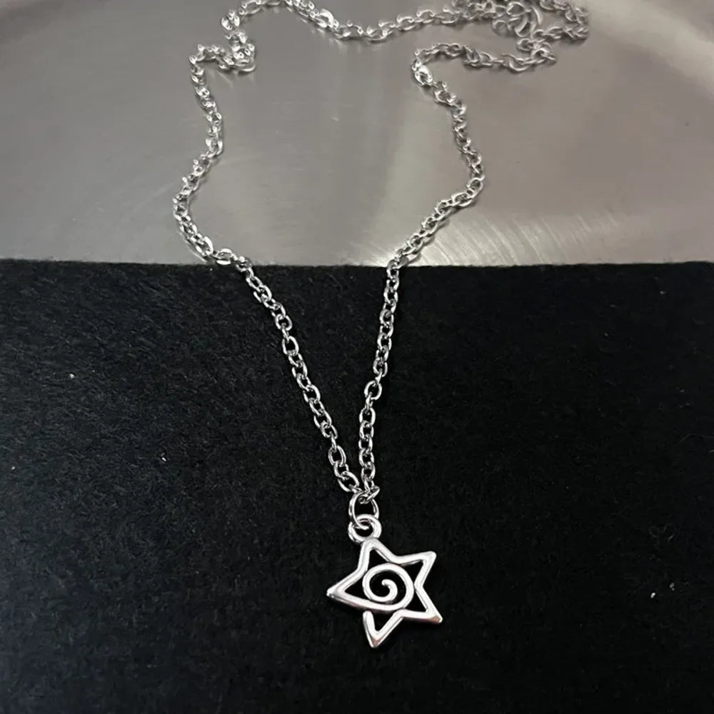 Music note heart necklace featuring treble and bass clef charms, stainless steel jewelry for women with infinity love symbol.
