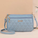 PU leather crossbody handbag for women featuring zipper closure, embroidery thread design, and large capacity shoulder purse.