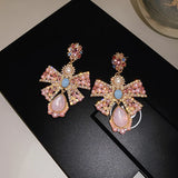 Pink crystal bowknot drop earrings for women, trendy statement jewelry by HSF Marketplace