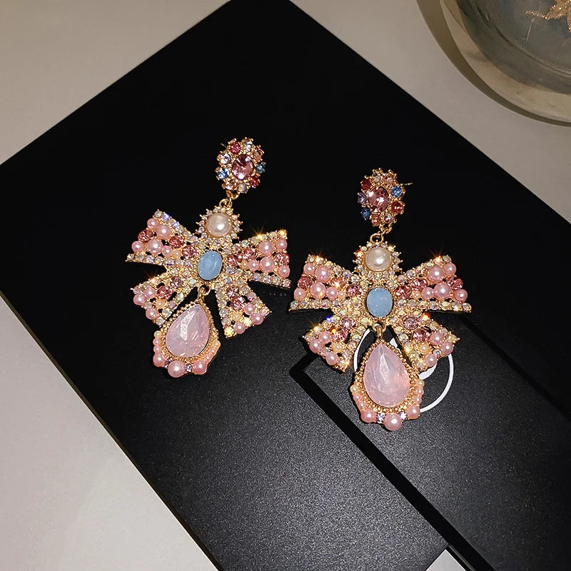 Pink crystal bowknot drop earrings for women, trendy statement jewelry by HSF Marketplace