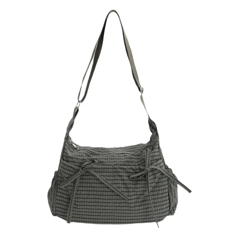 Women’s checkered nylon sling bag by HSF Marketplace with drawstring closure, large capacity crossbody style for shopping or casual outings.