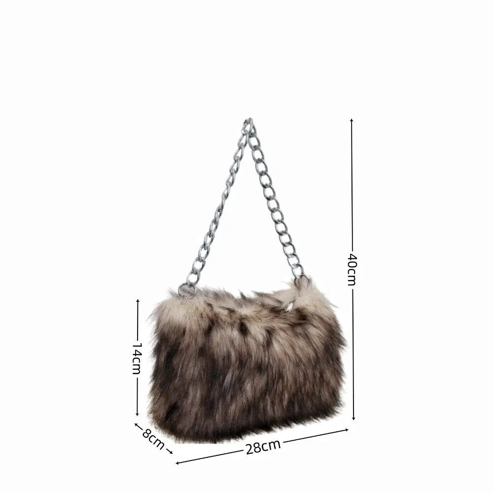 Luxury leopard print handbag by HSF Marketplace featuring a soft chain shoulder strap and spacious underarm design.