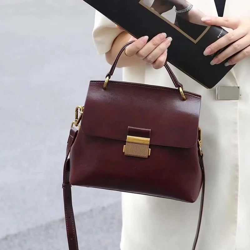 Vintage cow leather women’s handbag for stylish commuters by HSF Marketplace