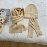 Women's knitted hat, scarf and glove set for autumn and winter warmth