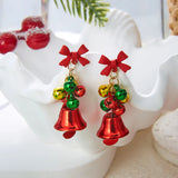 Festive snowflake tassel dangle earrings with bells for women by HSF Marketplace