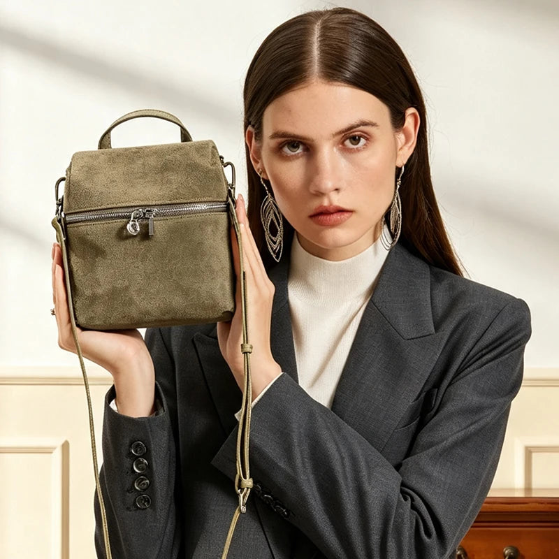 Genuine leather women's handbag with versatile shoulder and crossbody straps in a classic design