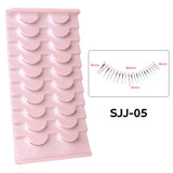 10 pairs of HSF Marketplace false eyelashes featuring wispy, flame-shaped lower lashes with clear bands for natural Korean makeup looks.